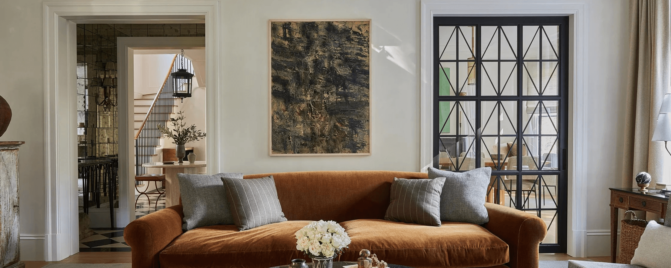 Image may contain Home Decor Couch Furniture Indoors Interior Design Table Cushion Art Painting and Architecture